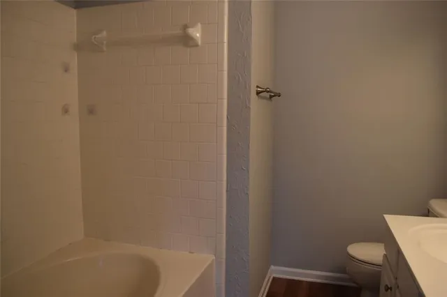 a bathroom with a sink and a toilet