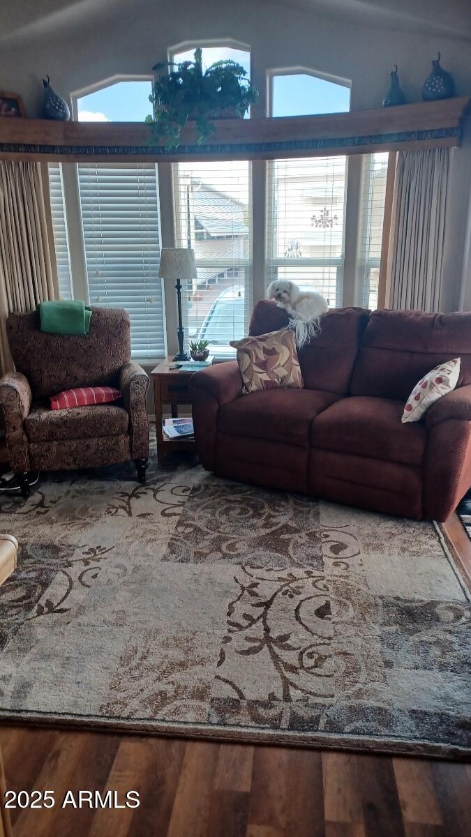 17200 West Bell Road, Unit 1519 Surprise, AZ 85374 - Photo 14 of 21 a living room with furniture and a large window