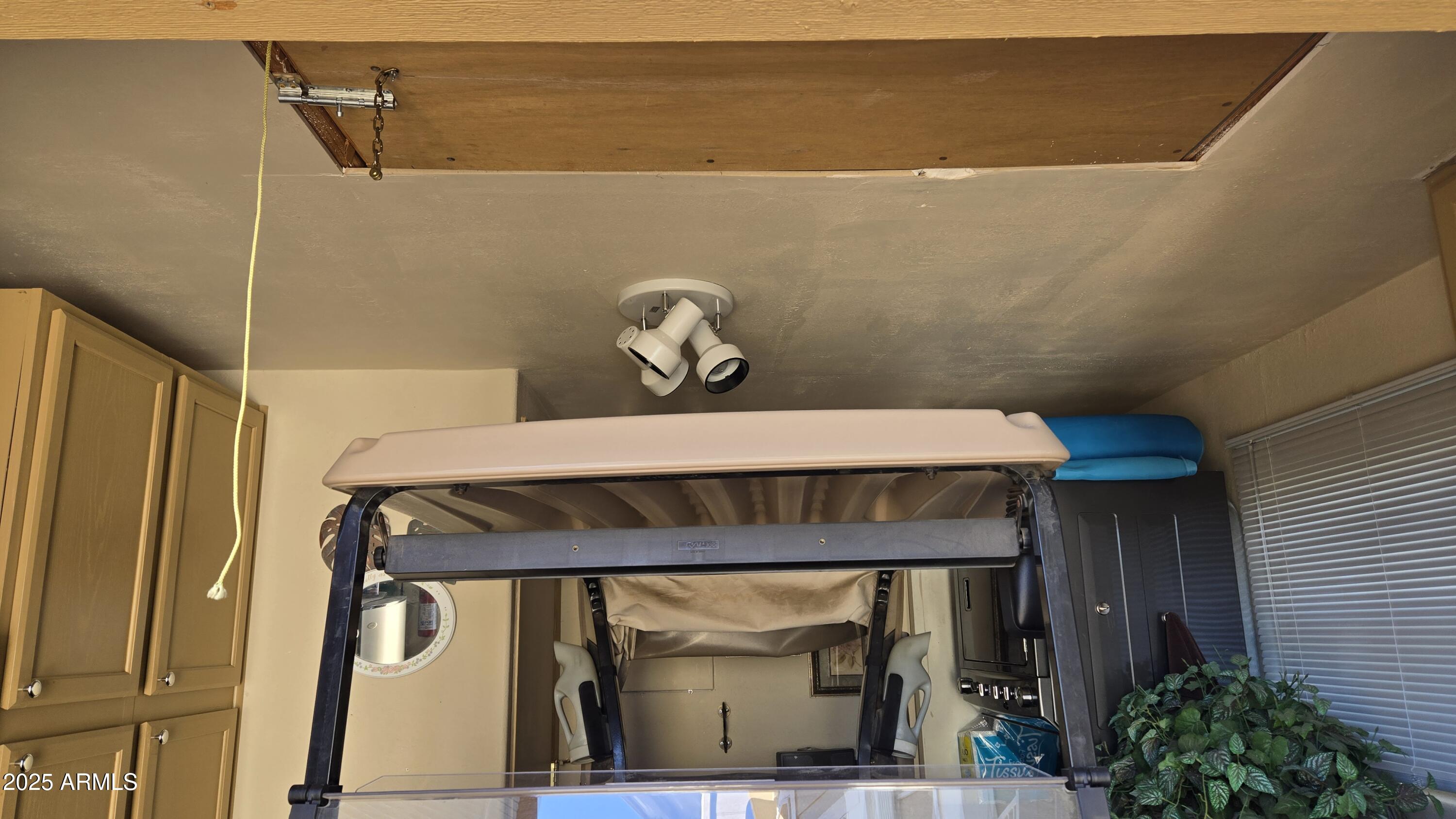 17200 West Bell Road, Unit 1519 Surprise, AZ 85374 - Photo 14 of 21 a bedroom with a bed and a window