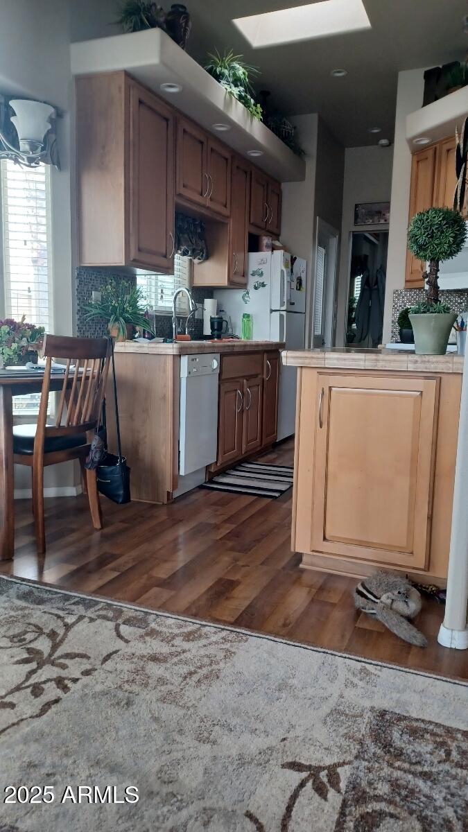 17200 West Bell Road, Unit 1519 Surprise, AZ 85374 - Photo 15 of 21 a view of kitchen with sink refrigerator and cabinets