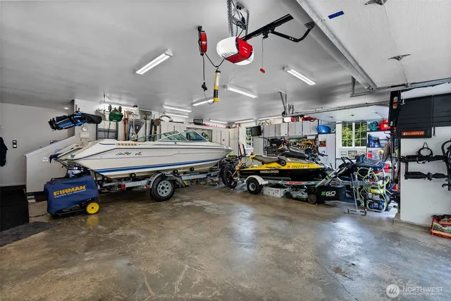 a kitchen area with lots of different colored cloths