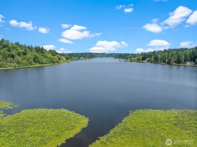 a view of a lake with a terrace