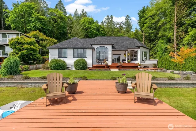 a view of a house with pool table and chairs