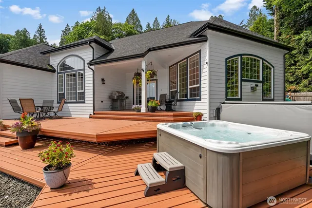 a view of backyard with sitting area