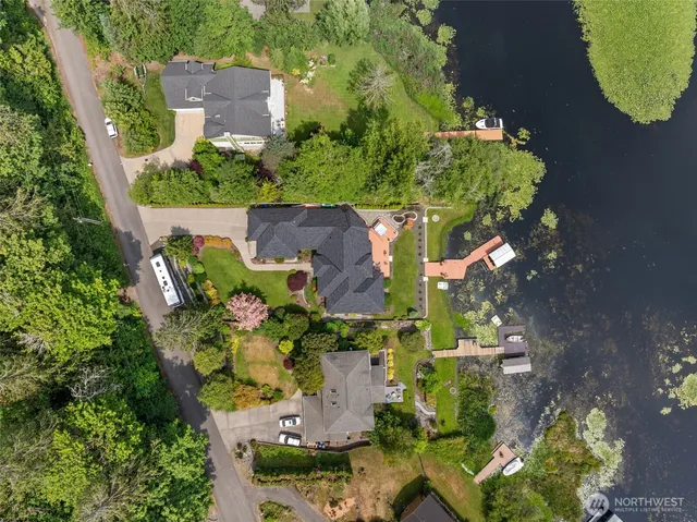 a view of a lake with outdoor seating