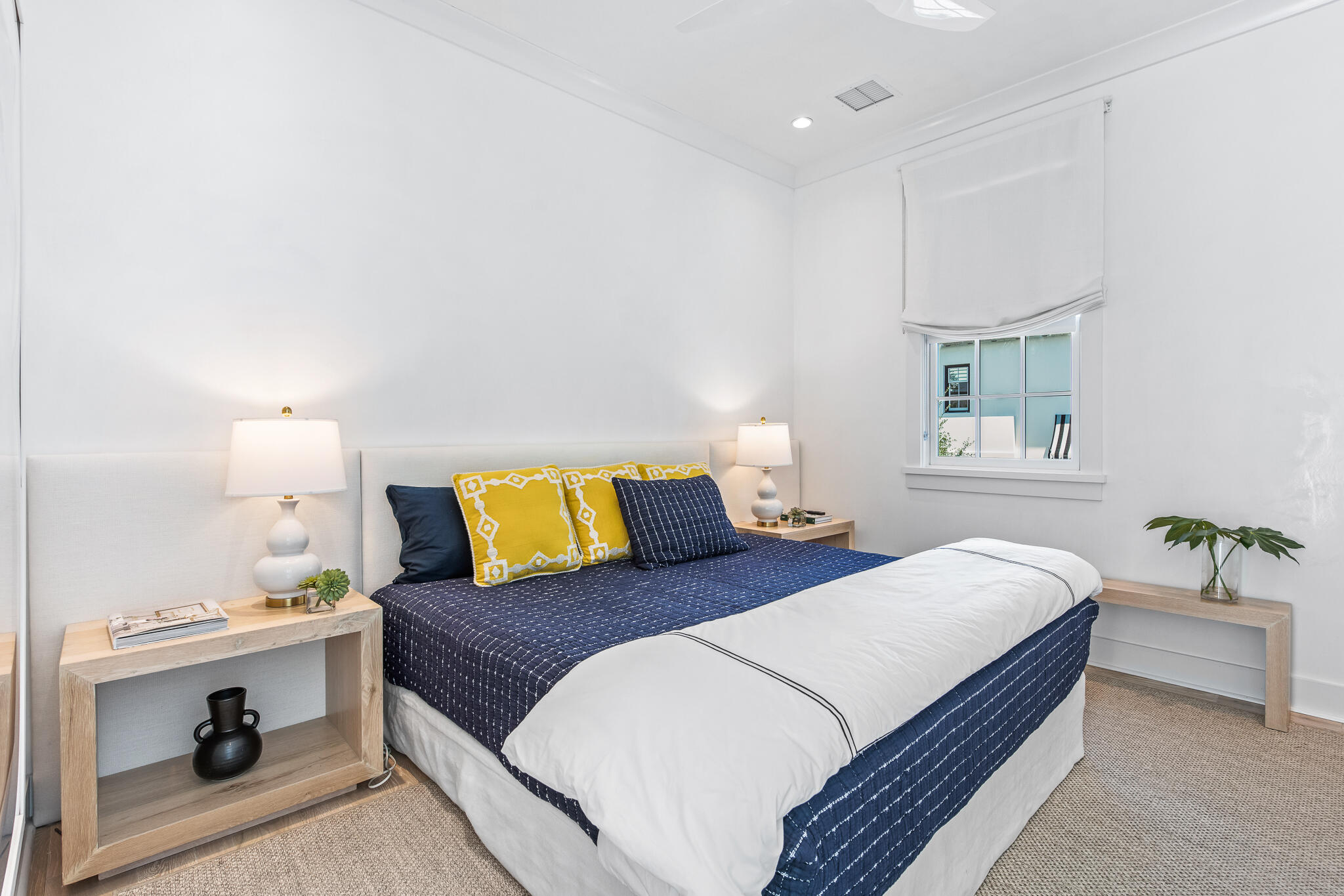 45 North Charles St Inlet Beach Inlet Beach, FL 32461 - Photo 38 of 53 a bedroom with a bed and a chandelier