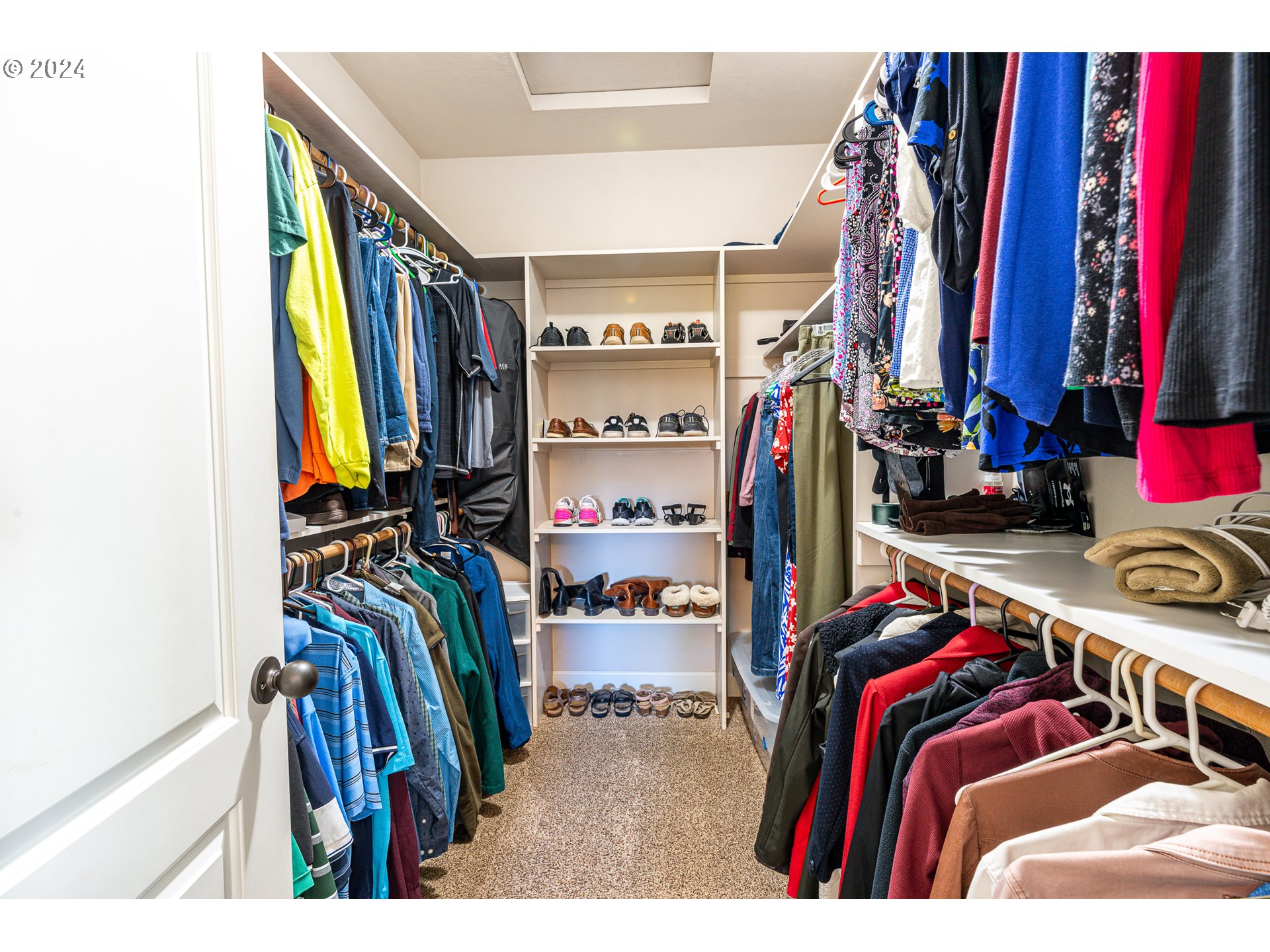 701 Blackstone Street Springfield, OR 97477 - Photo 20 of 40 a view of walk in closet with clothes and shoes