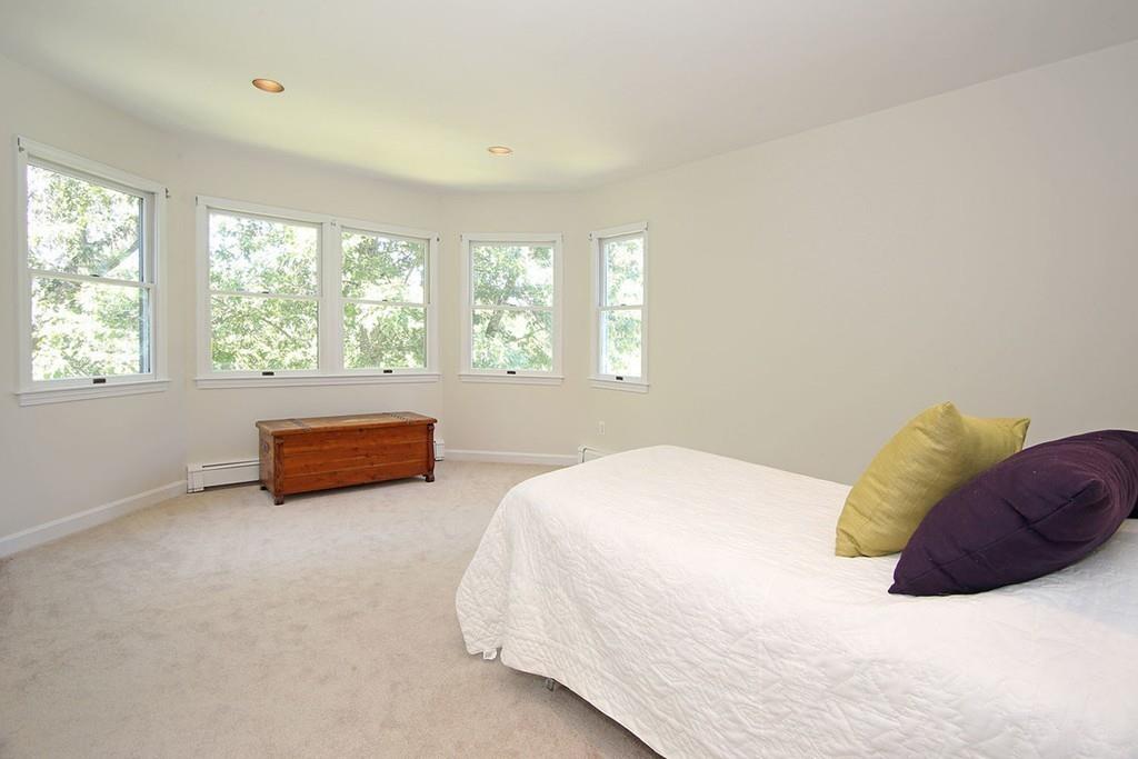 60 Schoolmasters Lane Dedham, MA 02026 - Photo 16 of 28 a spacious bedroom with a bed and a window