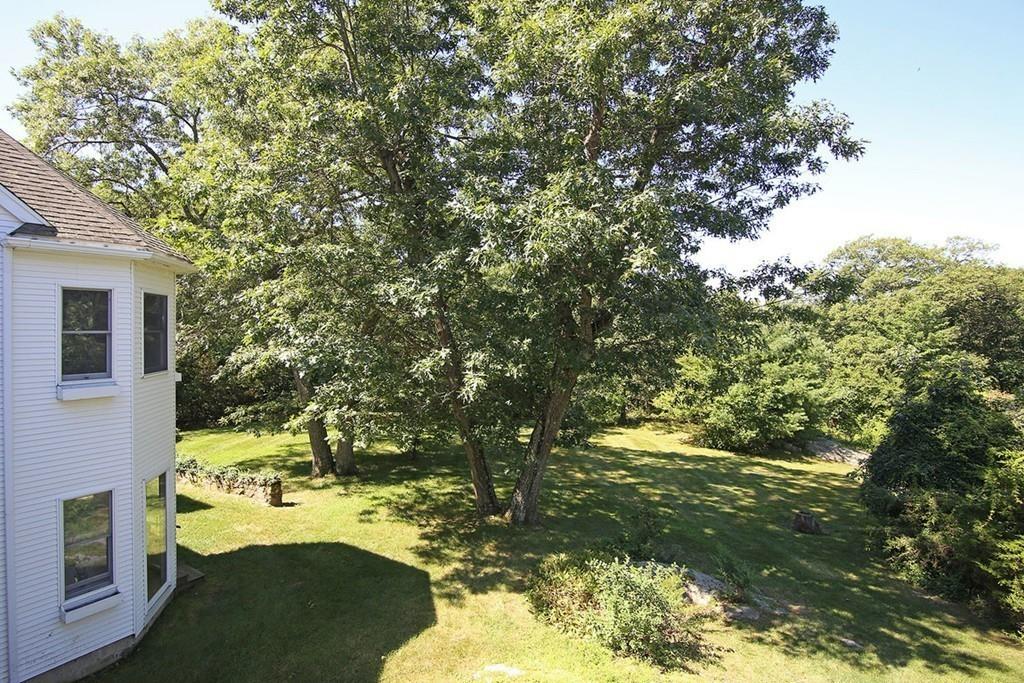 60 Schoolmasters Lane Dedham, MA 02026 - Photo 21 of 28 a view of yard with green space