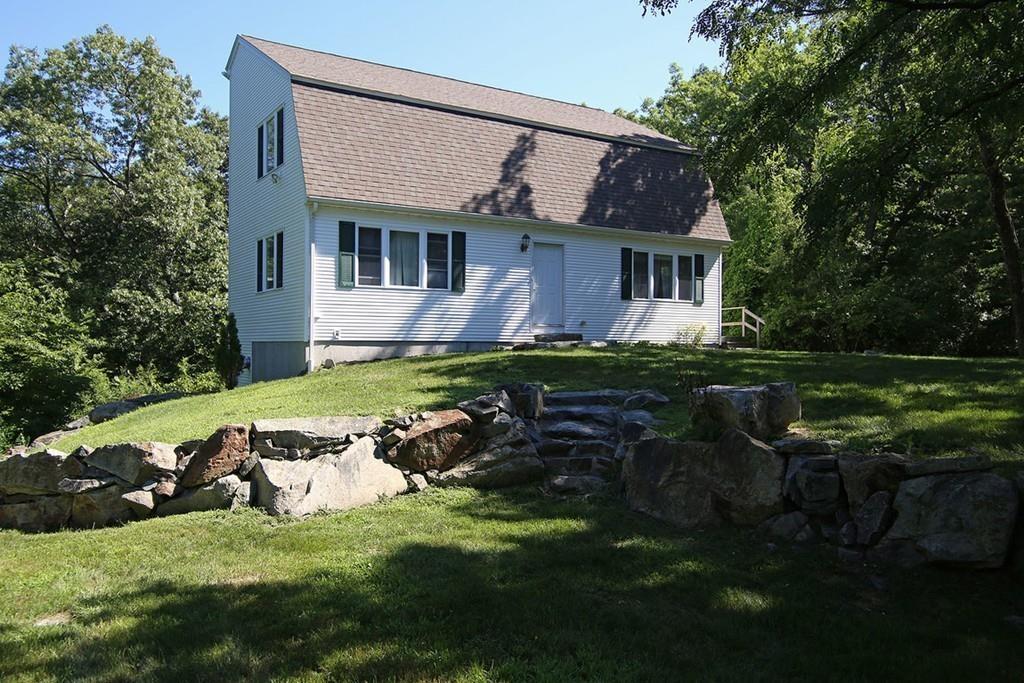 60 Schoolmasters Lane Dedham, MA 02026 - Photo 22 of 28 a view of a house with a backyard