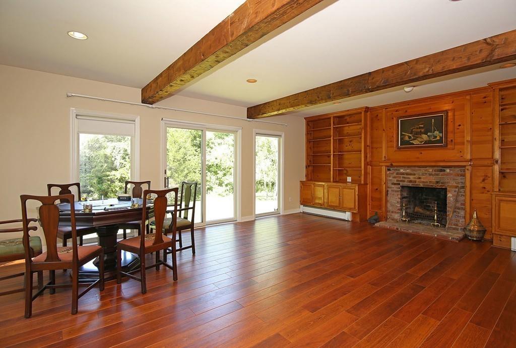 60 Schoolmasters Lane Dedham, MA 02026 - Photo 10 of 28 a view of a dining room with furniture window and wooden floor