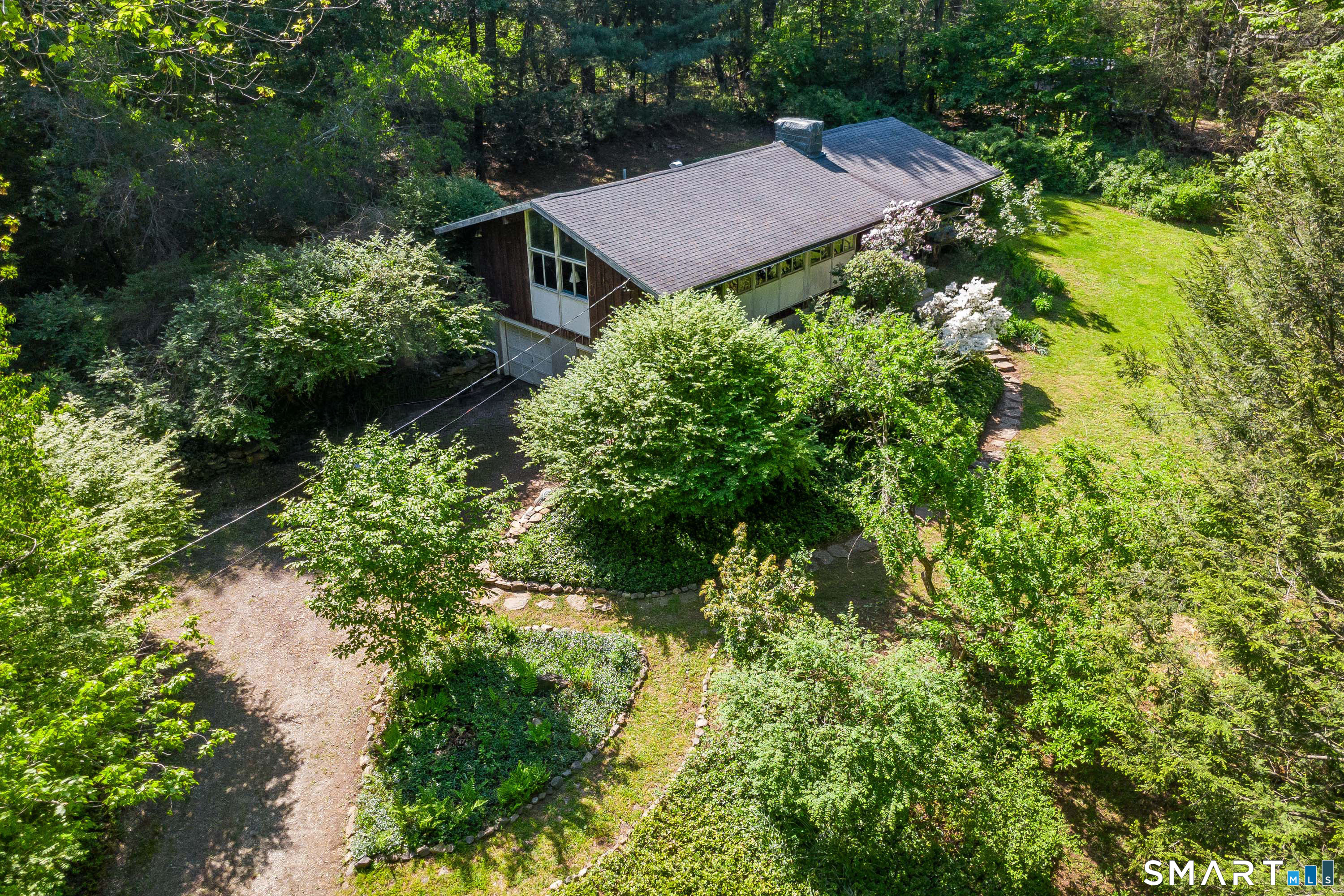 4 Pepper Pond Road Sherman, CT 06784 - Photo 26 of 33 a view of a garden in front of house