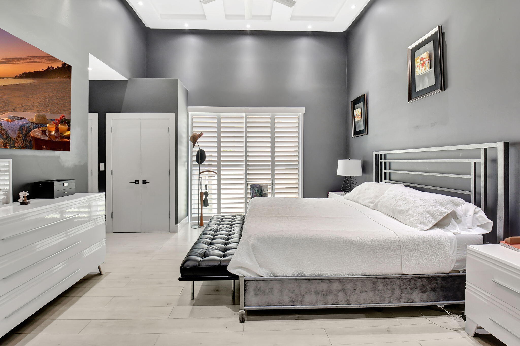 2550 Northwest 52nd Street Boca Raton, FL 33496 - Photo 18 of 56 a bedroom with a bed and a refrigerator