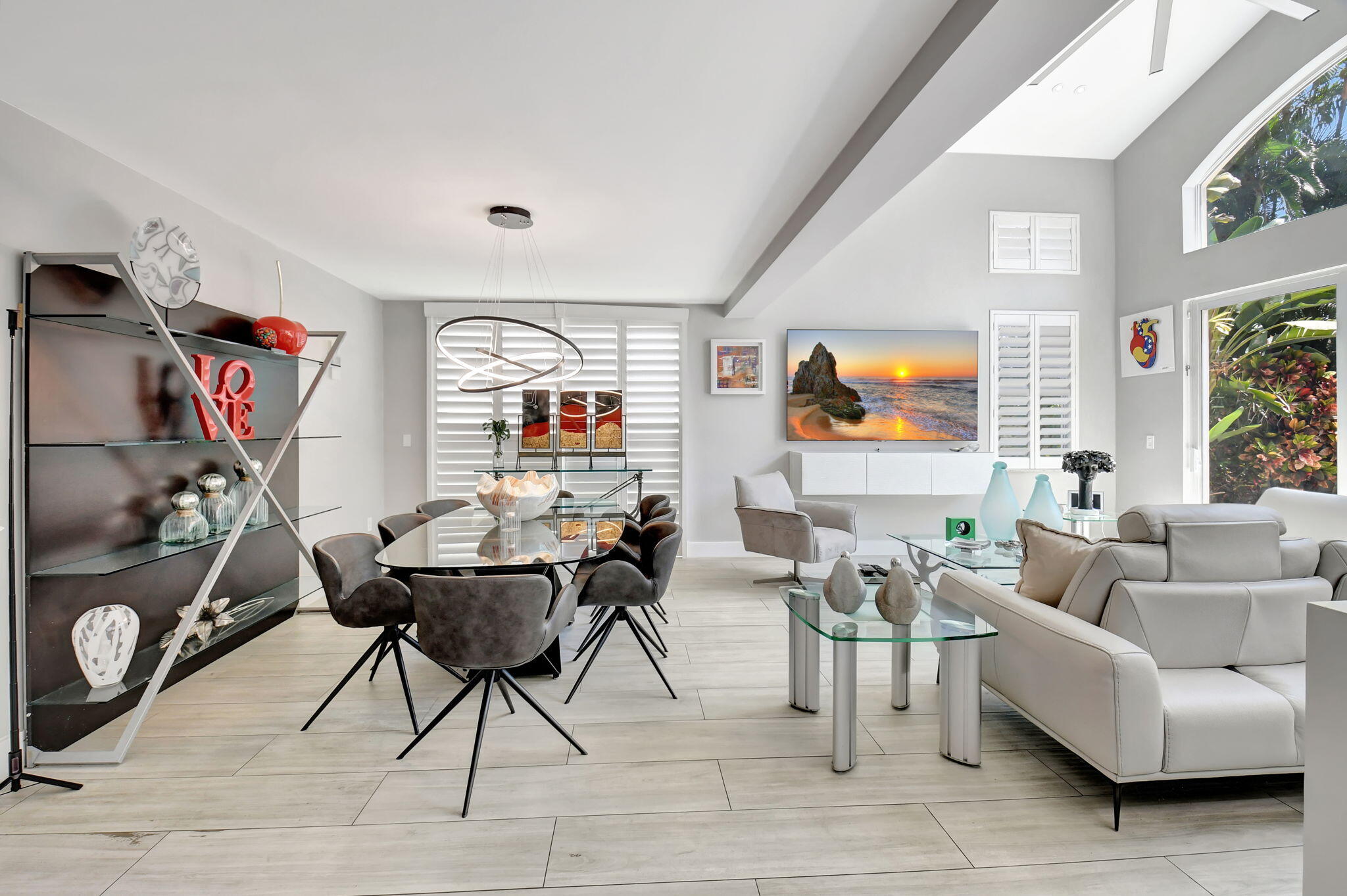 2550 Northwest 52nd Street Boca Raton, FL 33496 - Photo 6 of 56 a living room with furniture and a flat screen tv