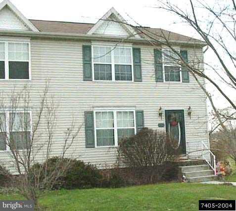 112 Ruel Avenue, Unit 7 Hanover, PA 17331 - Photo 1 of 1 a view of front of a house with a yard