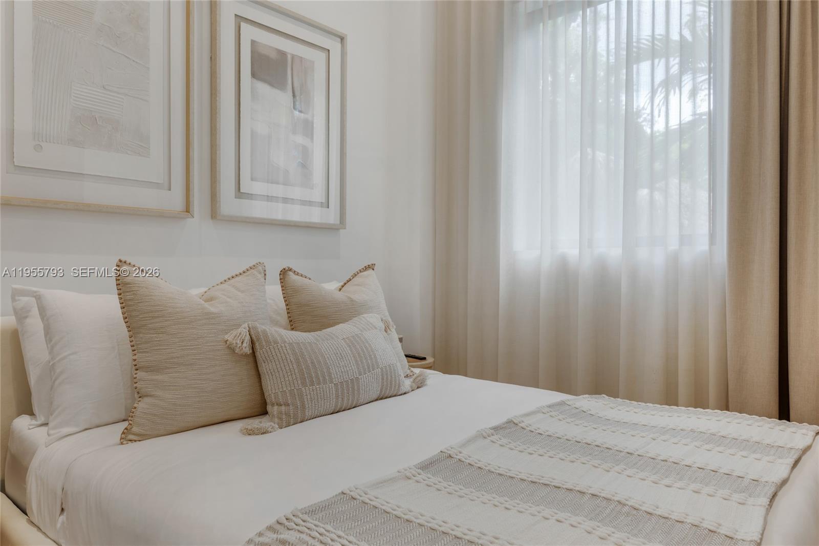 1000 Northwest 9th Court Miami, FL 33136 - Photo 27 of 43 a bed room with a bed and a mirror