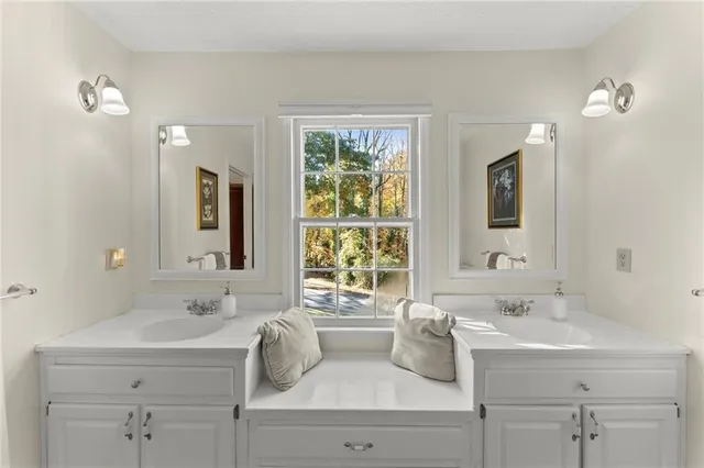 a bathroom with a sink and a bathtub