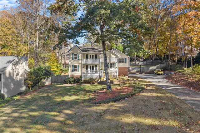 a view of a house with a garden