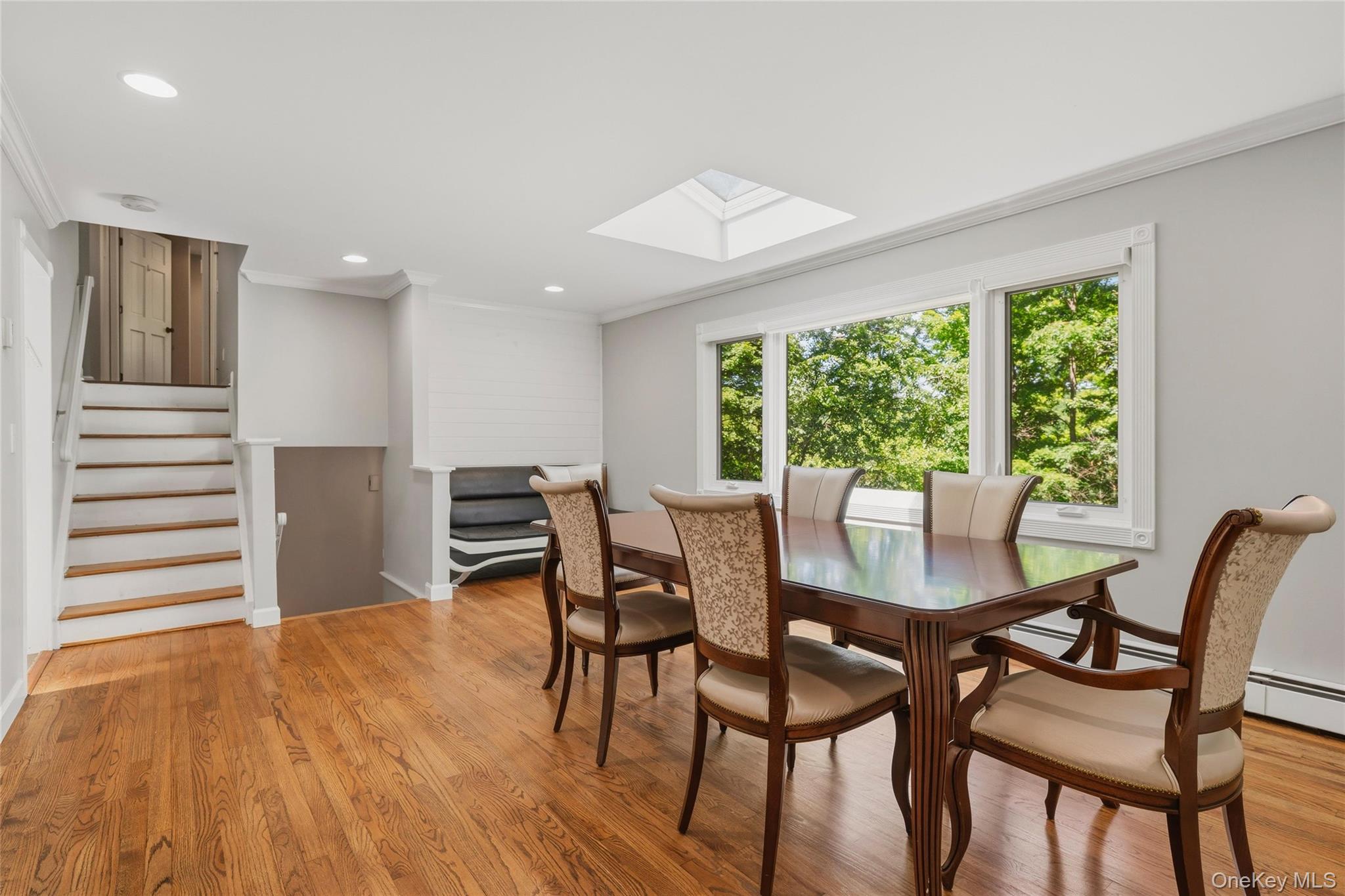 44 Sayer Road Blooming Grove, NY 10914 - Photo 5 of 39 a view of a dining room with furniture and wooden floor