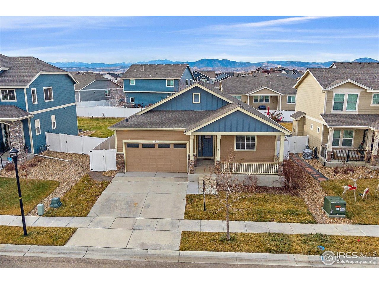 2321 Nicholson Street Berthoud, CO 80513 - Photo 1 of 22 a front view of a house with a yard