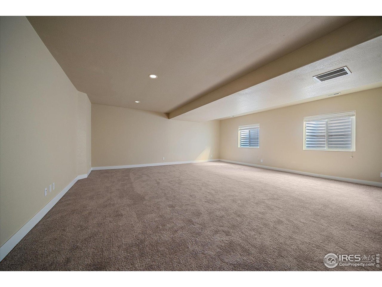 2321 Nicholson Street Berthoud, CO 80513 - Photo 16 of 22 a view of an empty room with a window