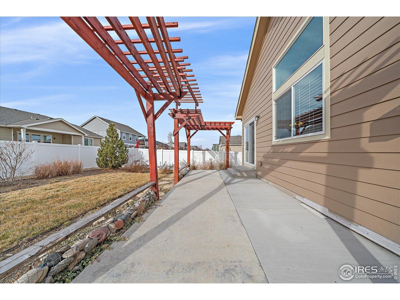 2321 Nicholson Street Berthoud, CO 80513 - Photo 21 of 22 a view of a backyard of the house