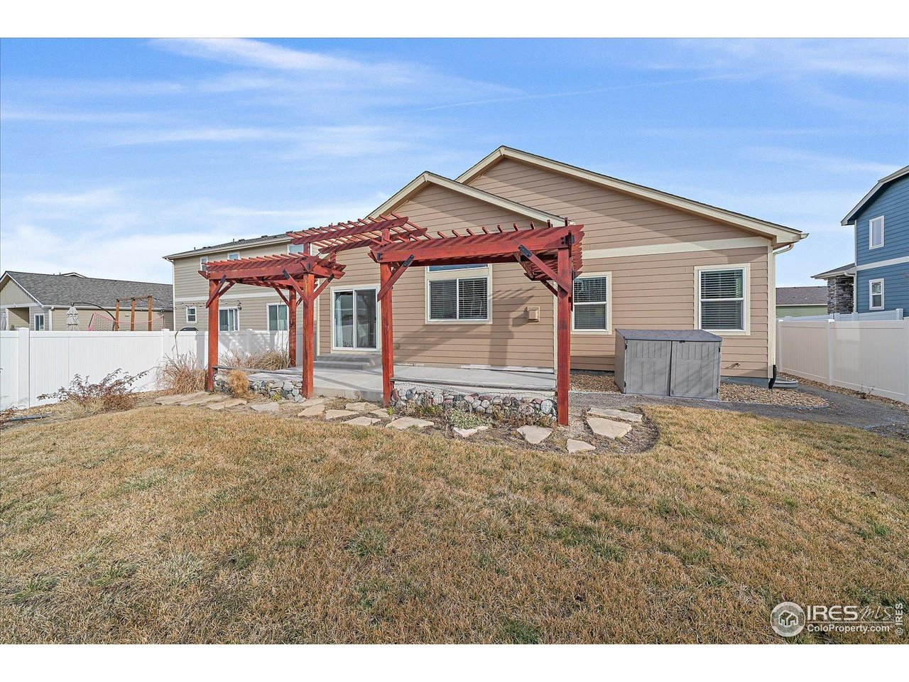 2321 Nicholson Street Berthoud, CO 80513 - Photo 22 of 22 a front view of a house with a yard