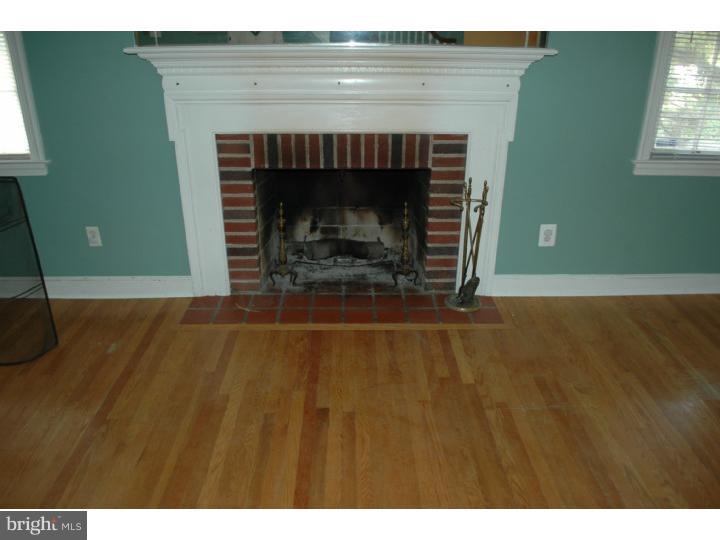 7609 Ivinetta Road Cheltenham, PA 19012 - Photo 9 of 24 Fireplace