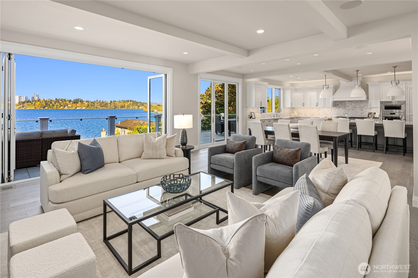 7254 North Mercer Way Mercer Island, WA 98040 - Photo 4 of 37 a living room with furniture kitchen view and a large window