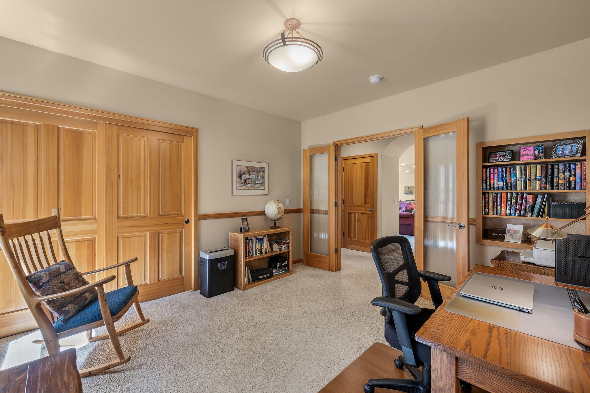 19574 Green Lakes Loop Bend, OR 97702 - Photo 23 of 41 The third bedroom is currently used as an office, offering flexibility for work-from-home needs, guests, or additional living space.