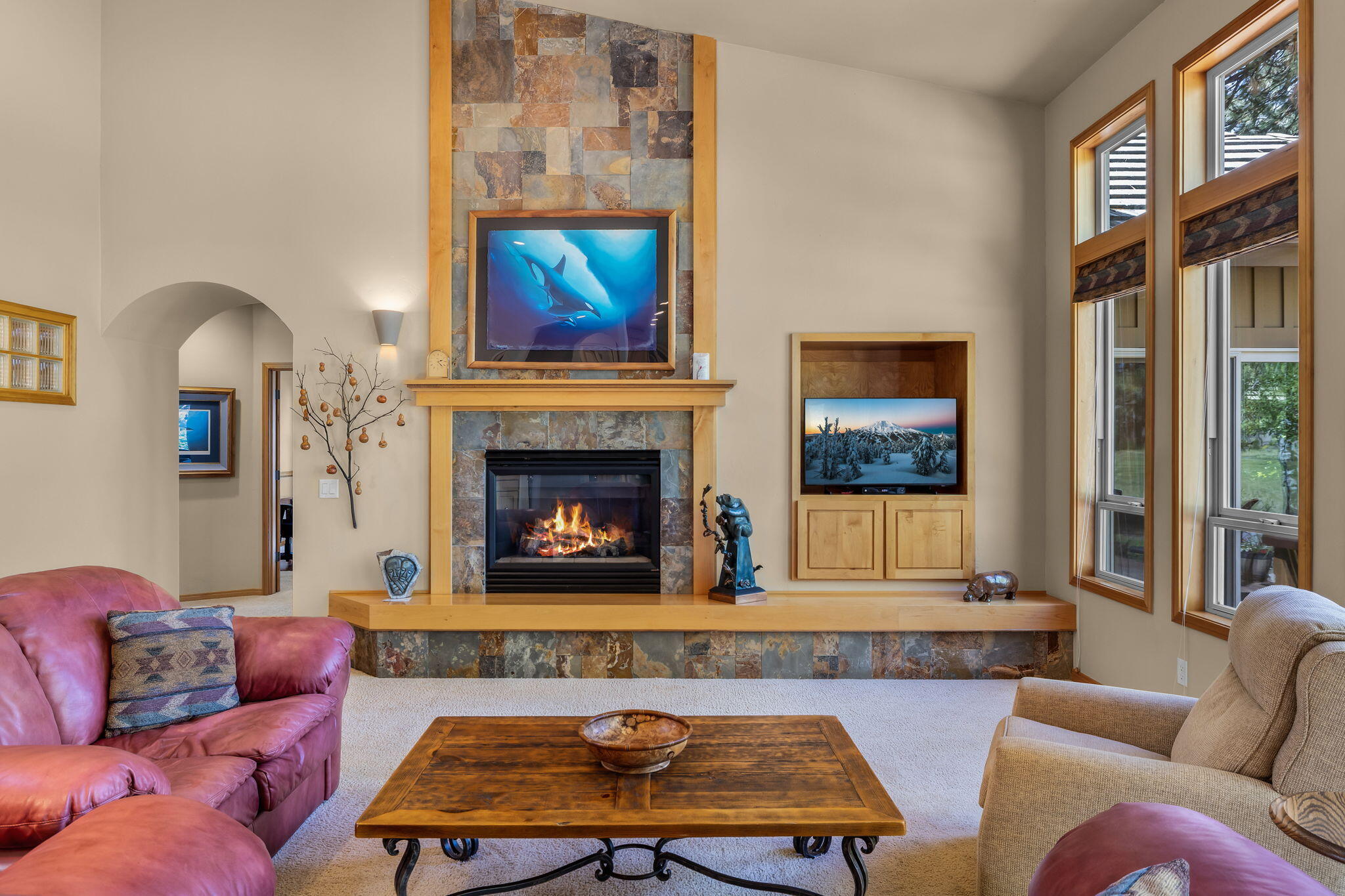 19574 Green Lakes Loop Bend, OR 97702 - Photo 6 of 41 A dramatic stone fireplace anchors the great room, adding warmth and architectural interest to the home?s central living space.