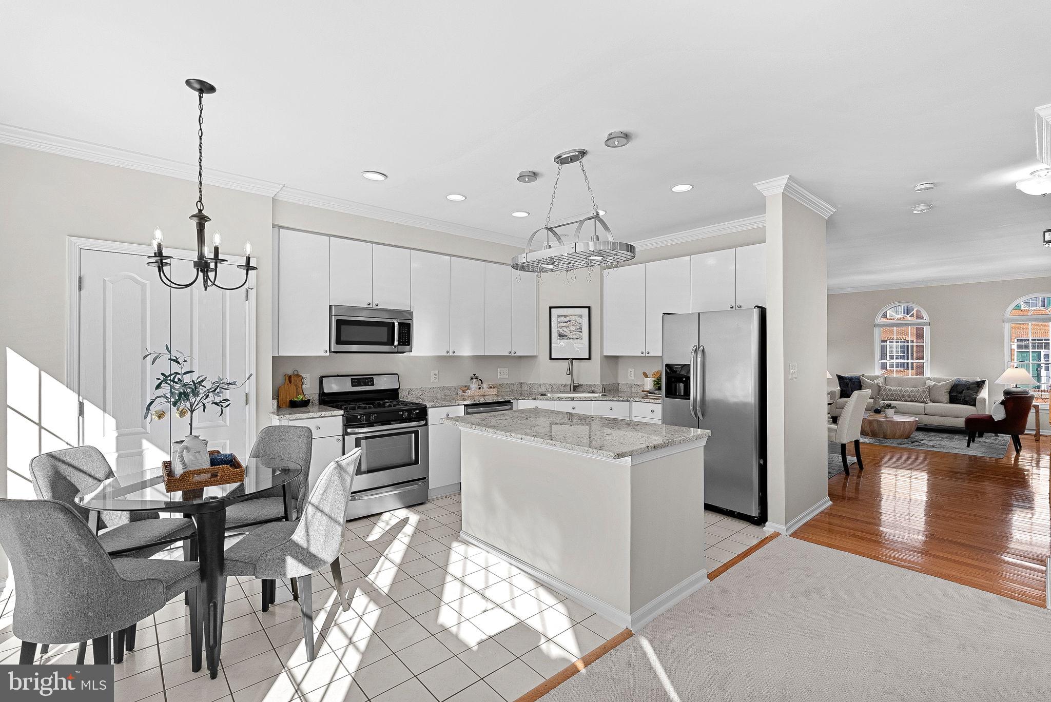 1733 Stuart Pointe Lane Herndon, VA 20194 - Photo 11 of 49 a view of a kitchen and dining room