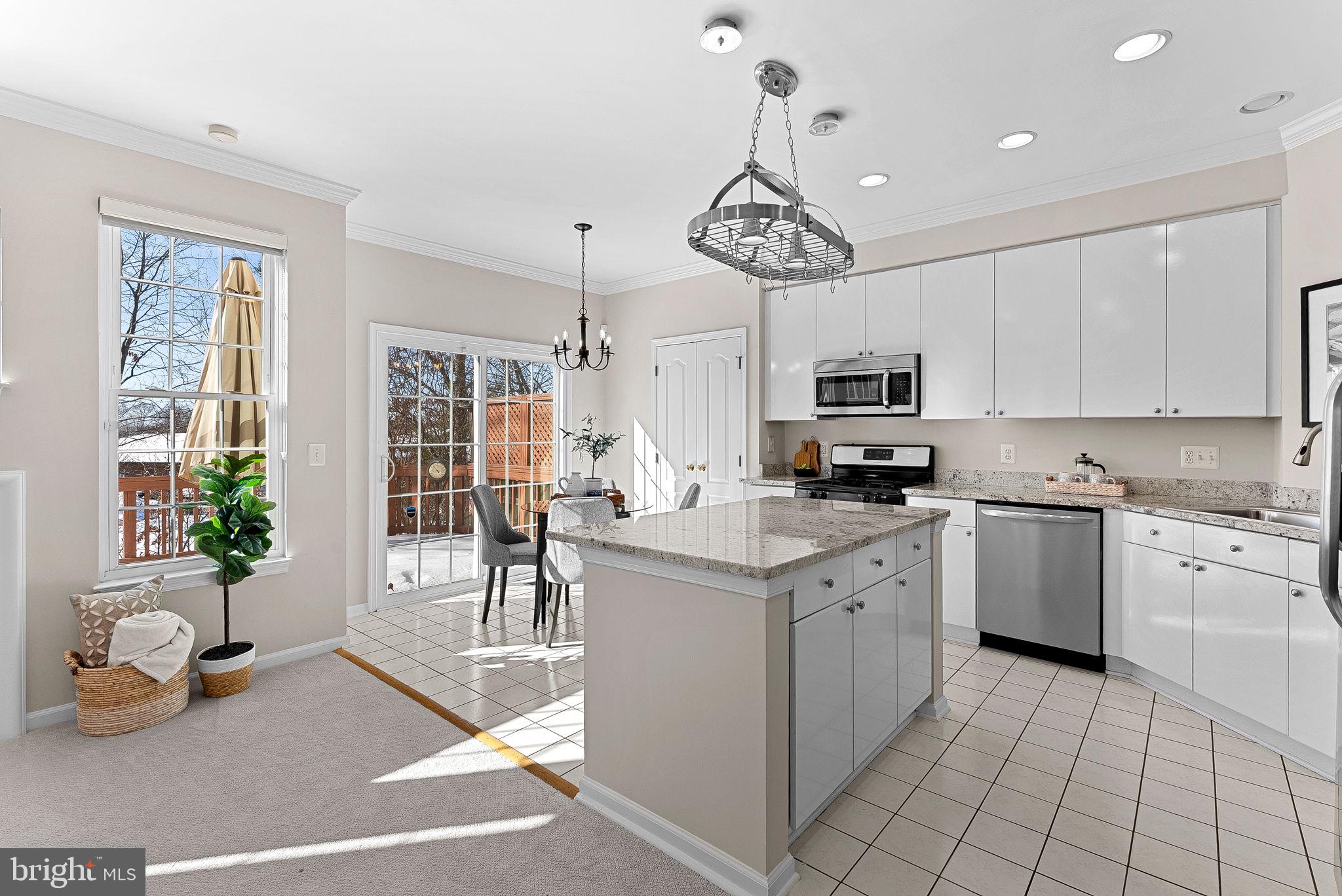 1733 Stuart Pointe Lane Herndon, VA 20194 - Photo 13 of 49 a kitchen with a counter space cabinets and appliances