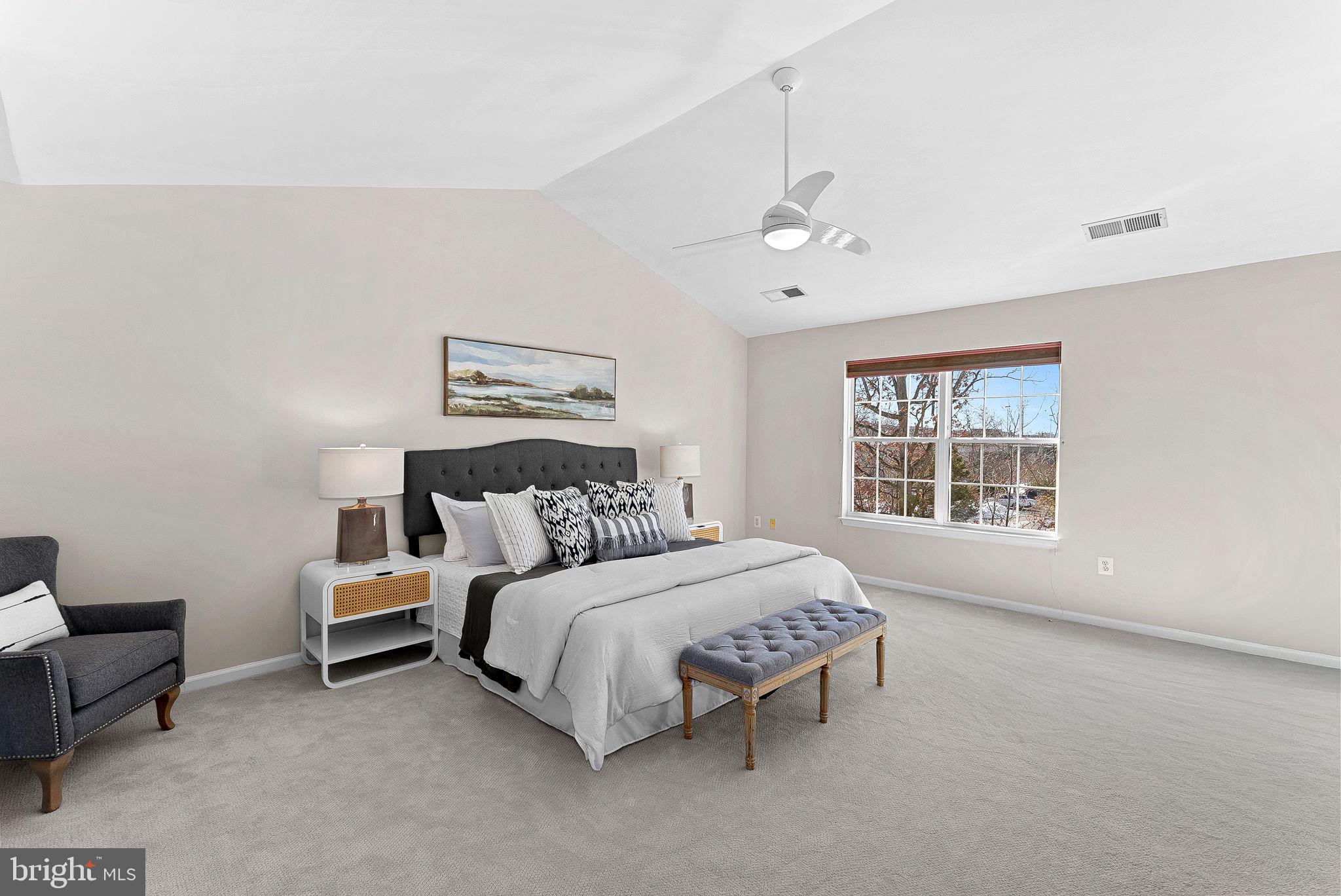 1733 Stuart Pointe Lane Herndon, VA 20194 - Photo 25 of 49 a bedroom with a bed furniture and a window