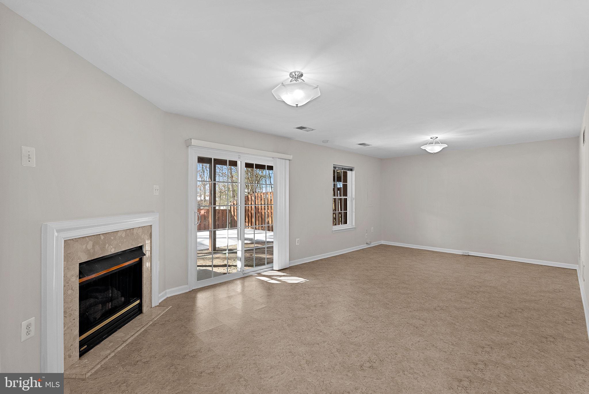 1733 Stuart Pointe Lane Herndon, VA 20194 - Photo 42 of 49 a view of empty room with a fireplace