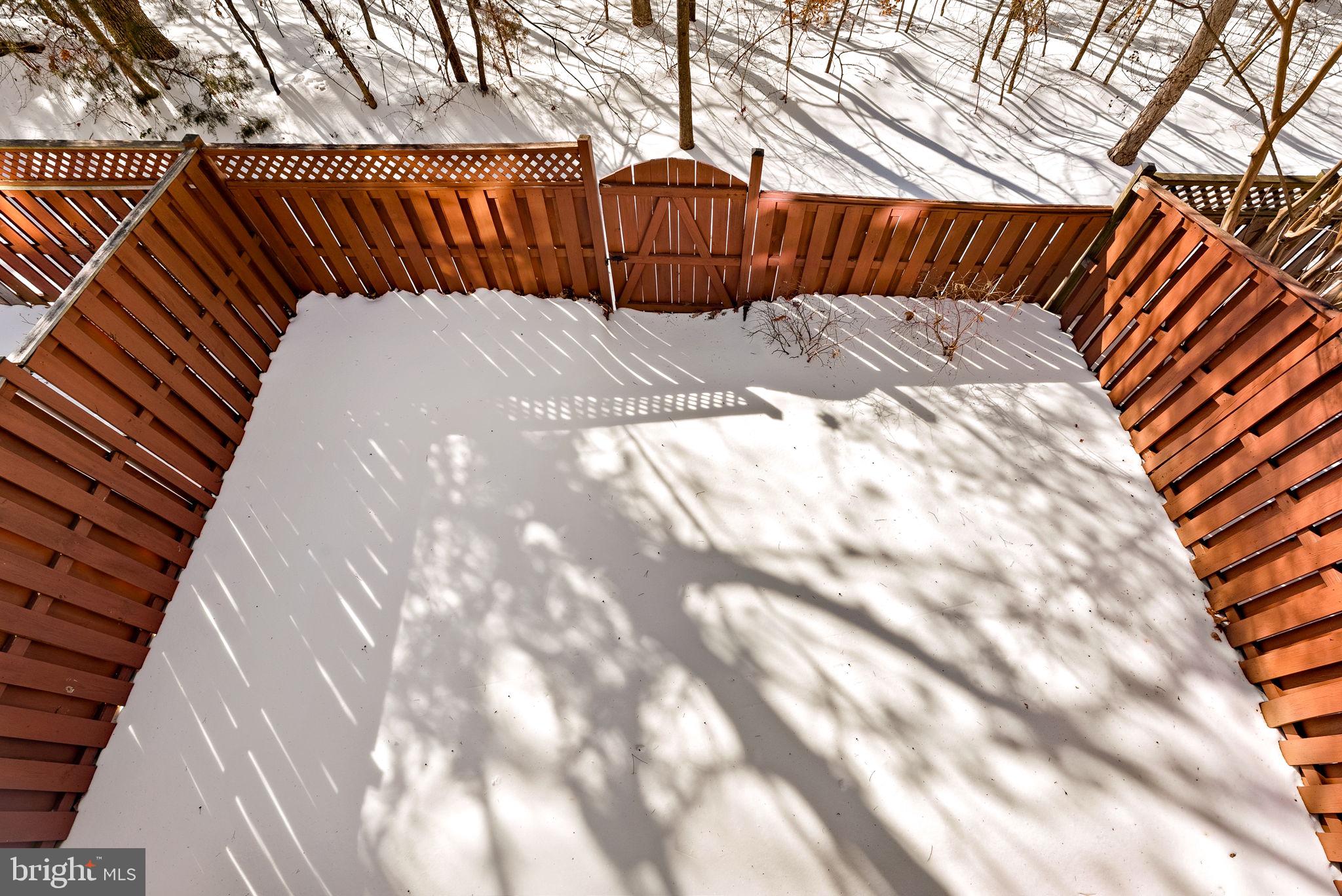 1733 Stuart Pointe Lane Herndon, VA 20194 - Photo 45 of 49 a view of backyard with wooden fence
