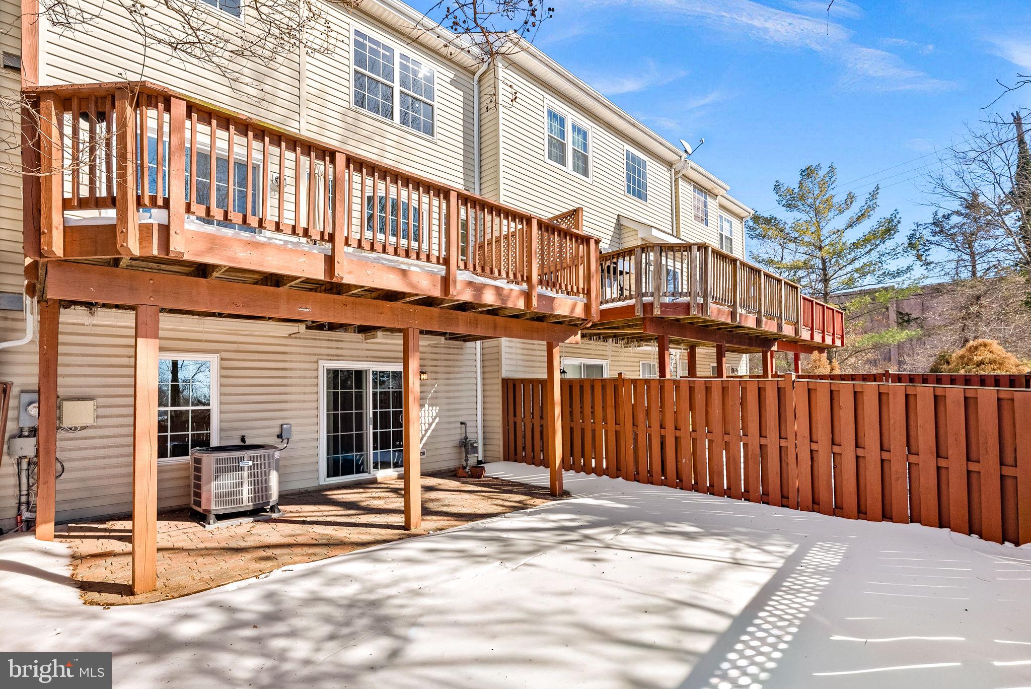 1733 Stuart Pointe Lane Herndon, VA 20194 - Photo 46 of 49 a view of a building with a outdoor space