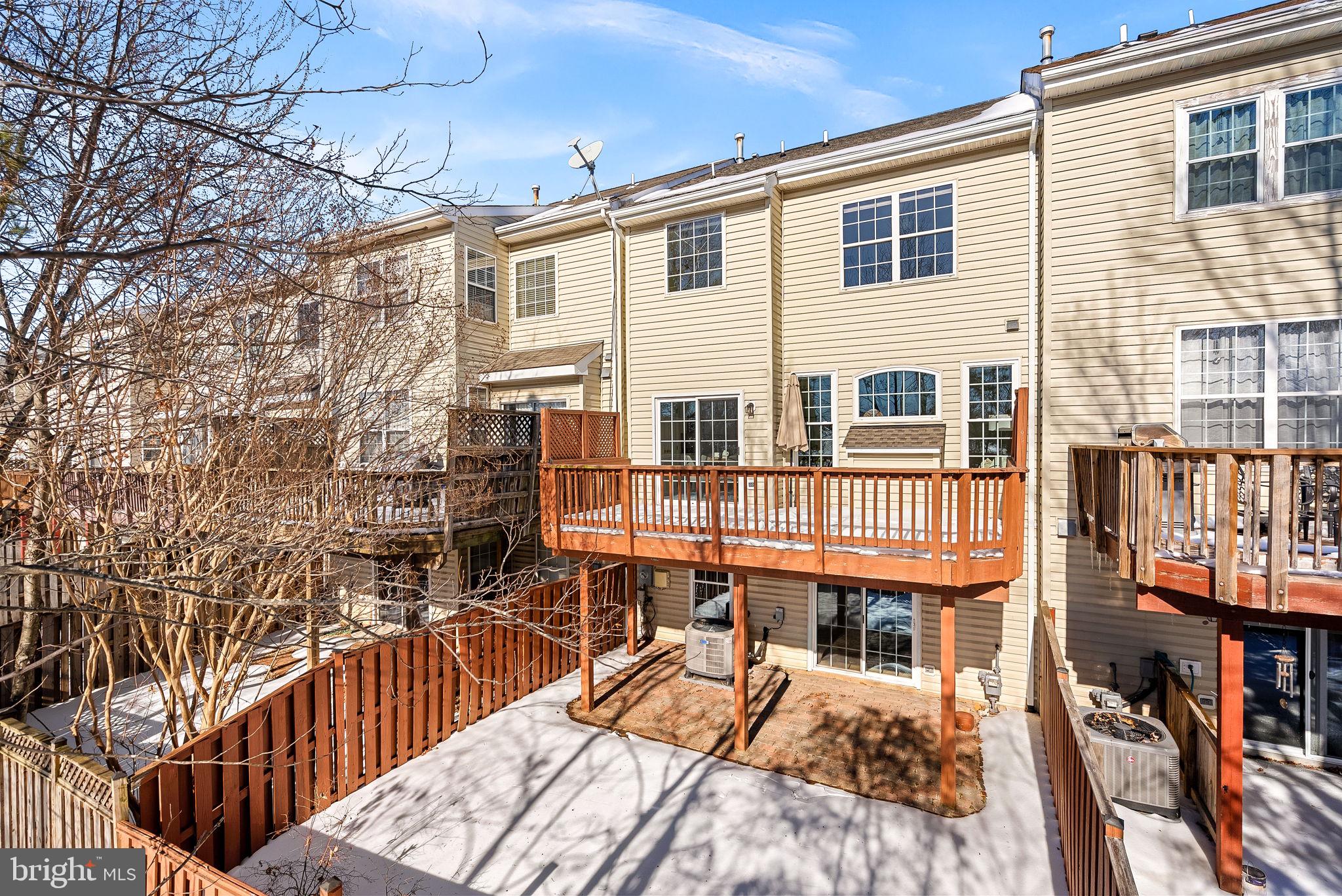 1733 Stuart Pointe Lane Herndon, VA 20194 - Photo 47 of 49 a view of a house with a patio