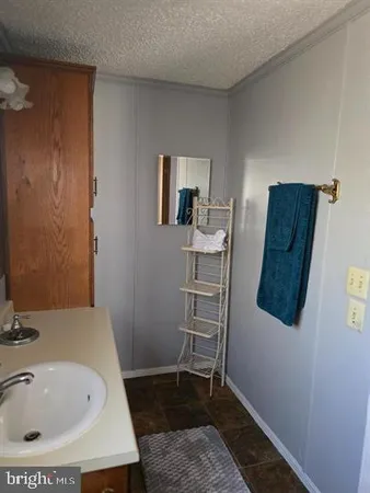 a room with gym equipment and a window