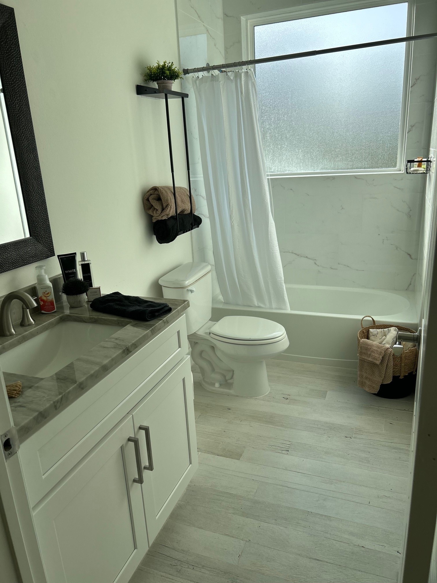 646 Echo Lane Livingston, TX 77351 - Photo 25 of 30 a bathroom with a sink and a mirror