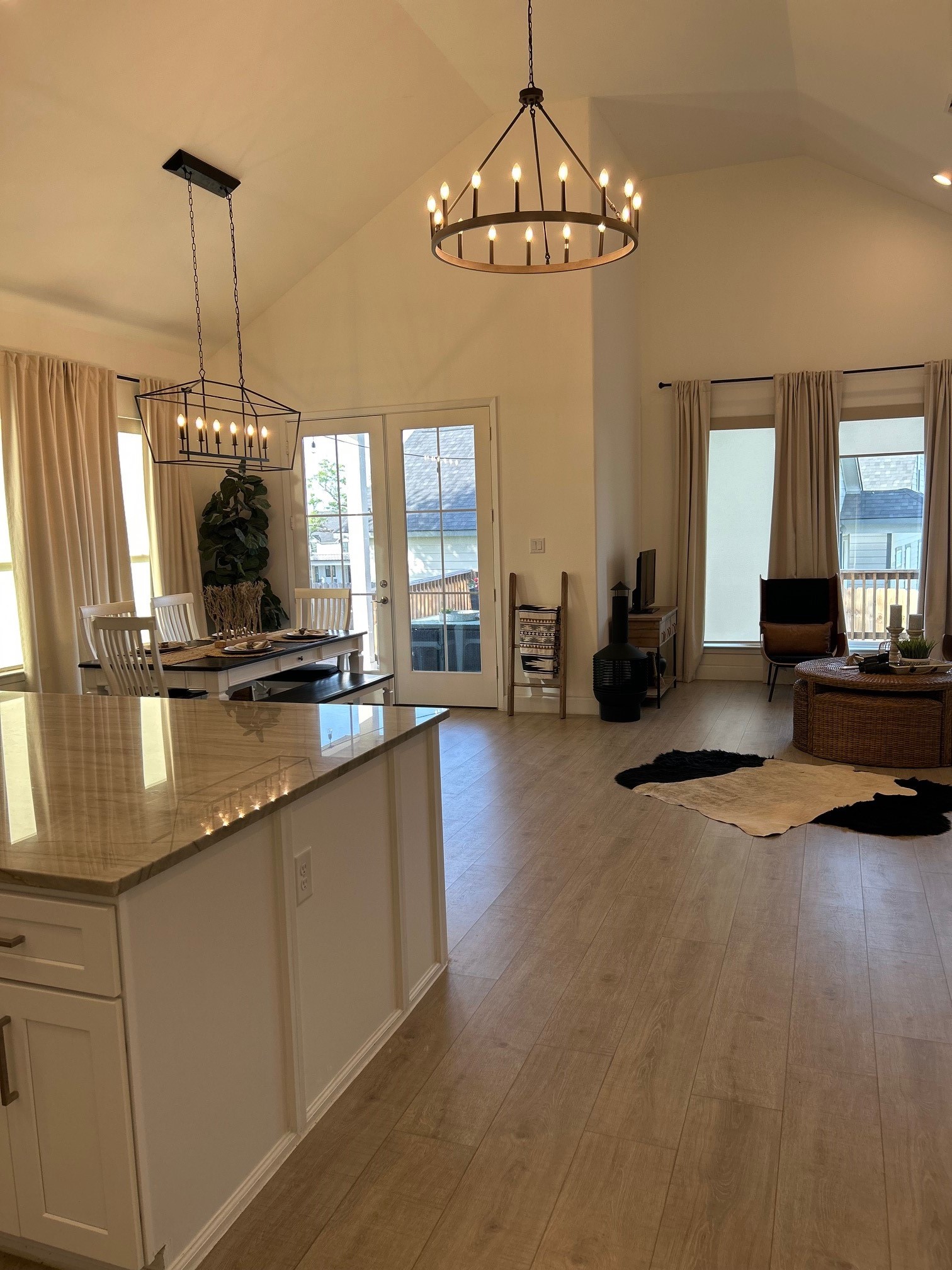 646 Echo Lane Livingston, TX 77351 - Photo 28 of 30 a view of a kitchen with granite countertop a sink and a chandelier