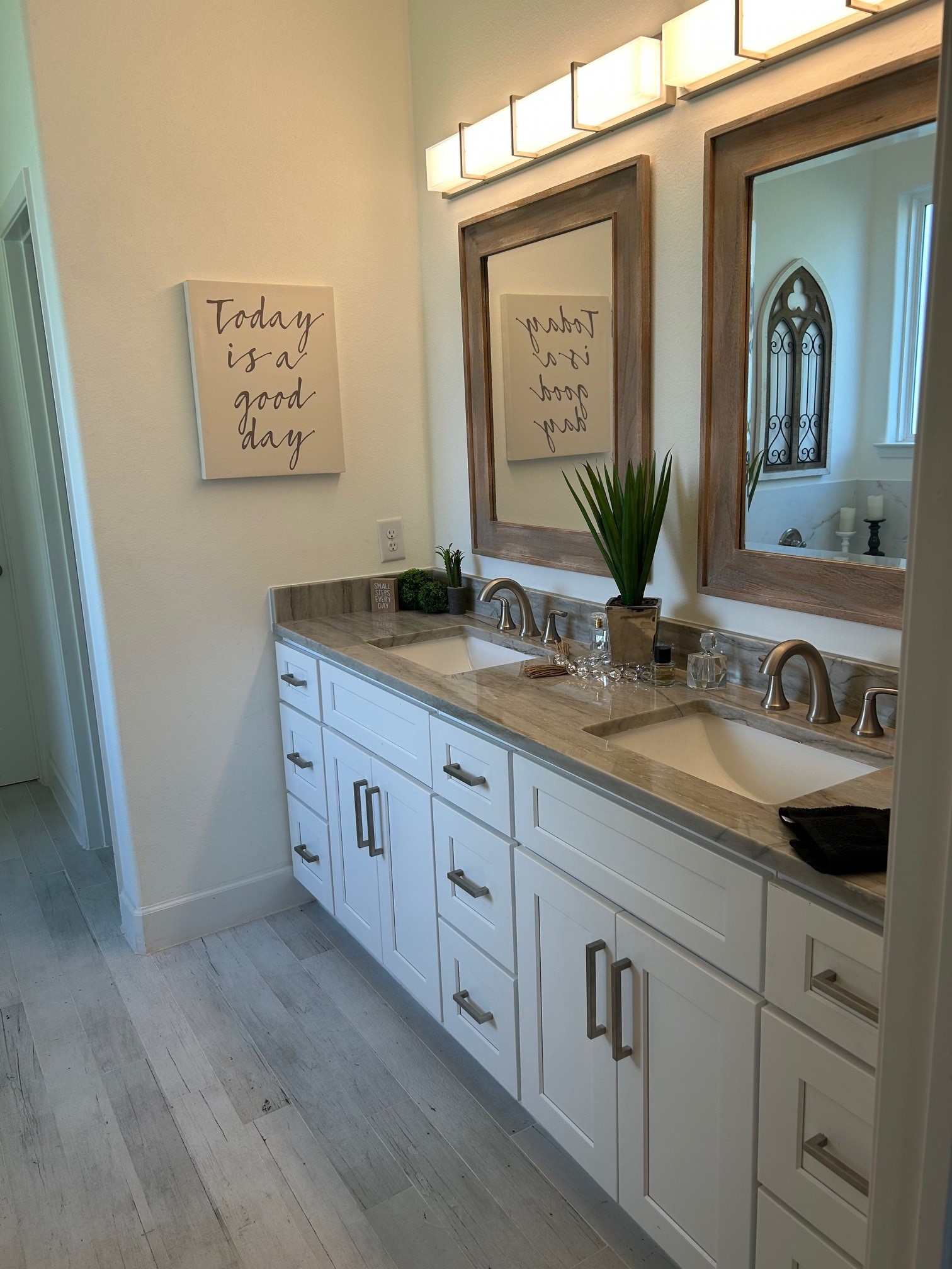 646 Echo Lane Livingston, TX 77351 - Photo 29 of 30 a spacious bathroom with a granite countertop sink and a mirror
