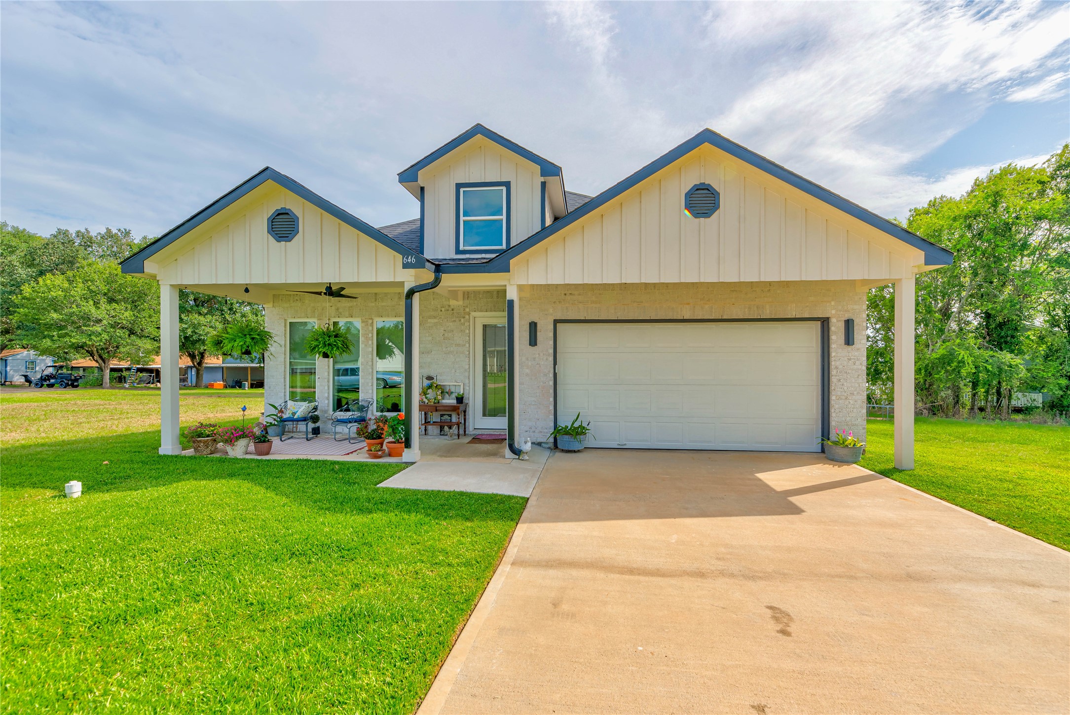 646 Echo Lane Livingston, TX 77351 - Photo 6 of 30 a view of a house with a yard and sitting area