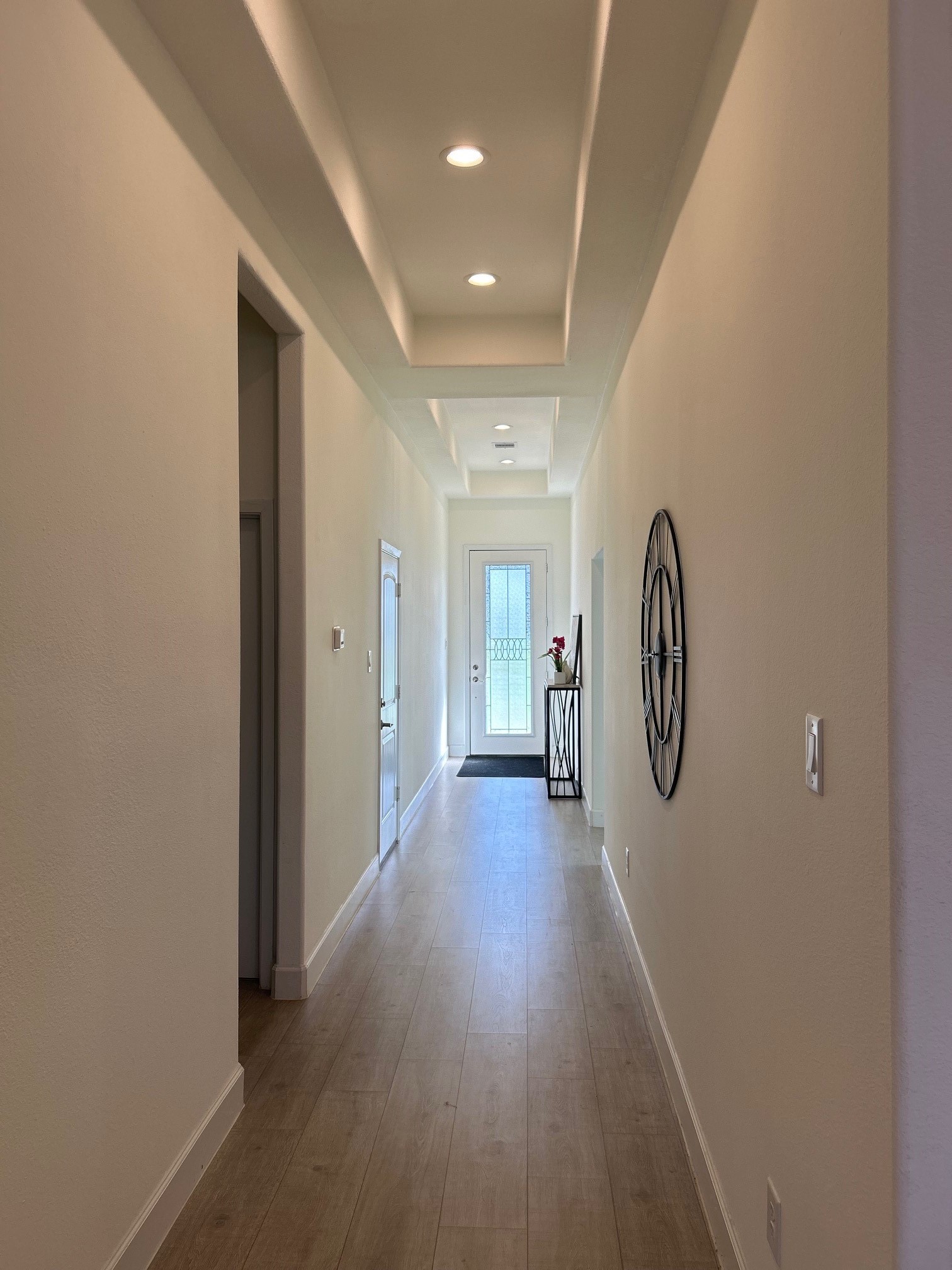 646 Echo Lane Livingston, TX 77351 - Photo 10 of 30 a view of a hallway with wooden floor