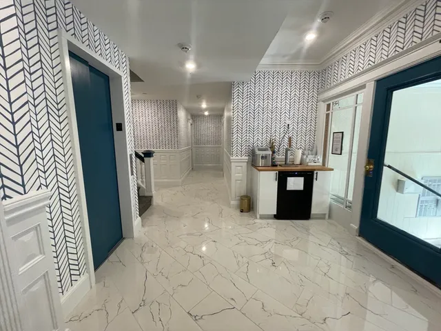 a sign on the side of a wall