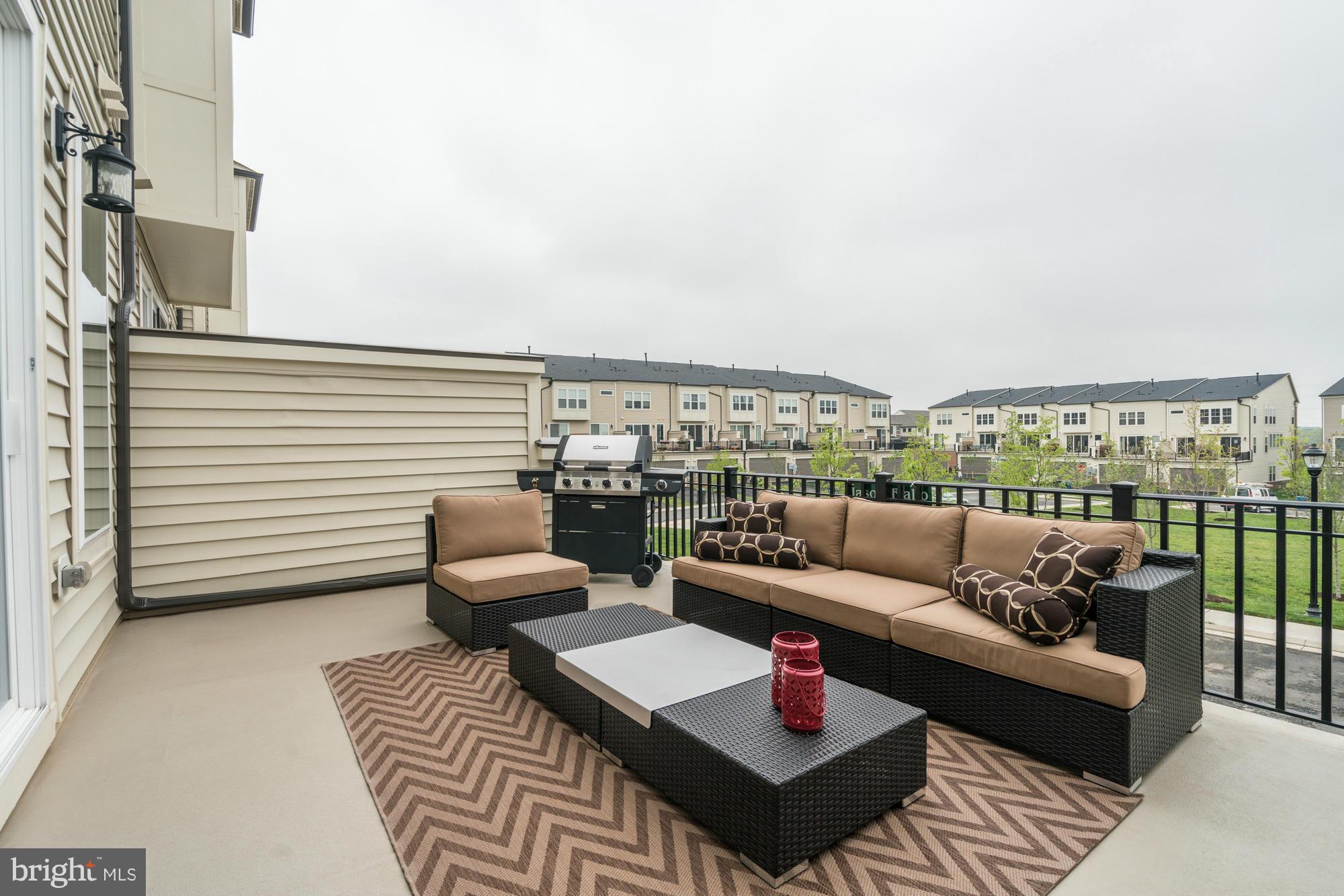 42277 Riggins Ridge Terrace Ashburn, VA 20148 - Photo 29 of 30 a terrace view with seating space