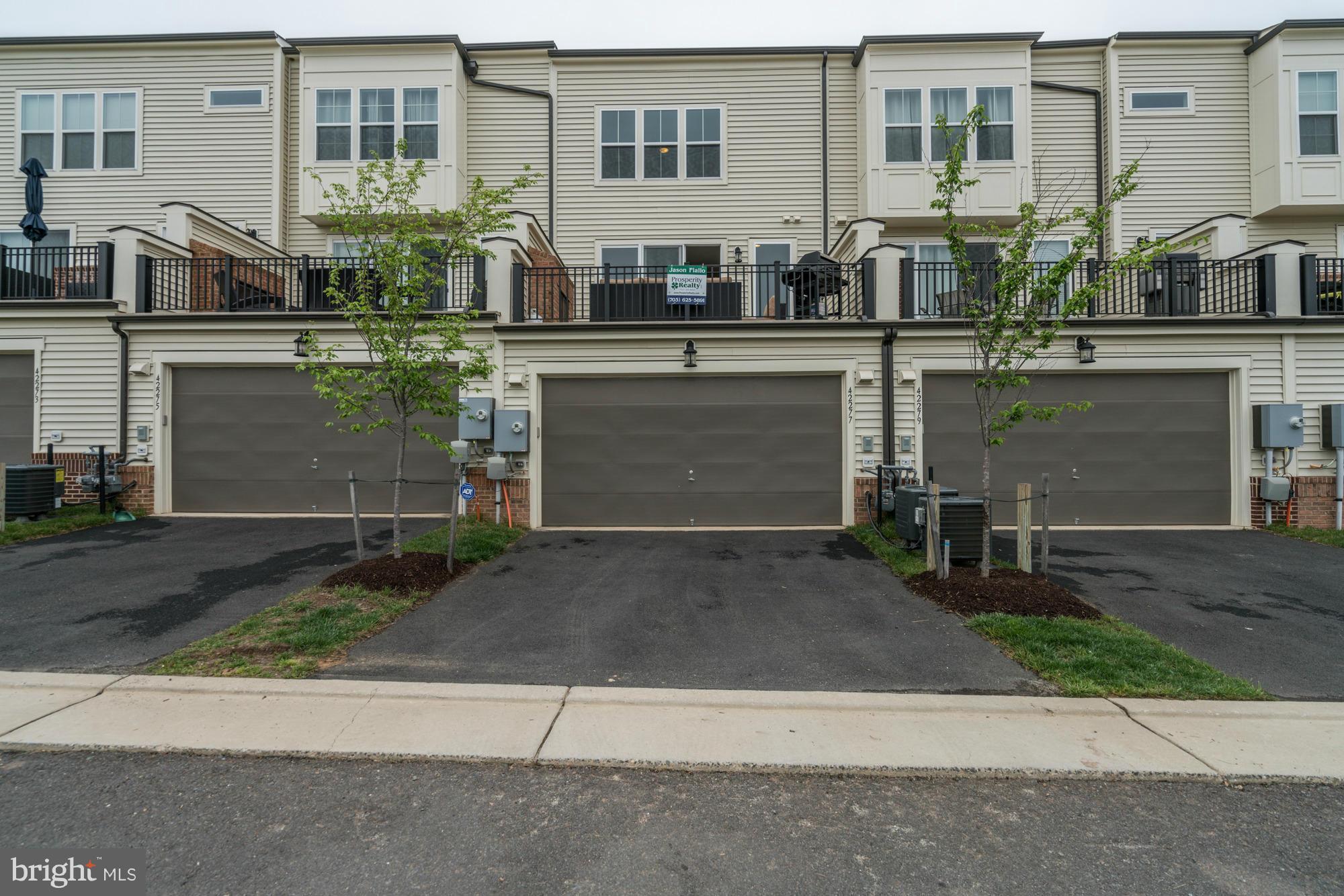 42277 Riggins Ridge Terrace Ashburn, VA 20148 - Photo 30 of 30 front view of house with a yard