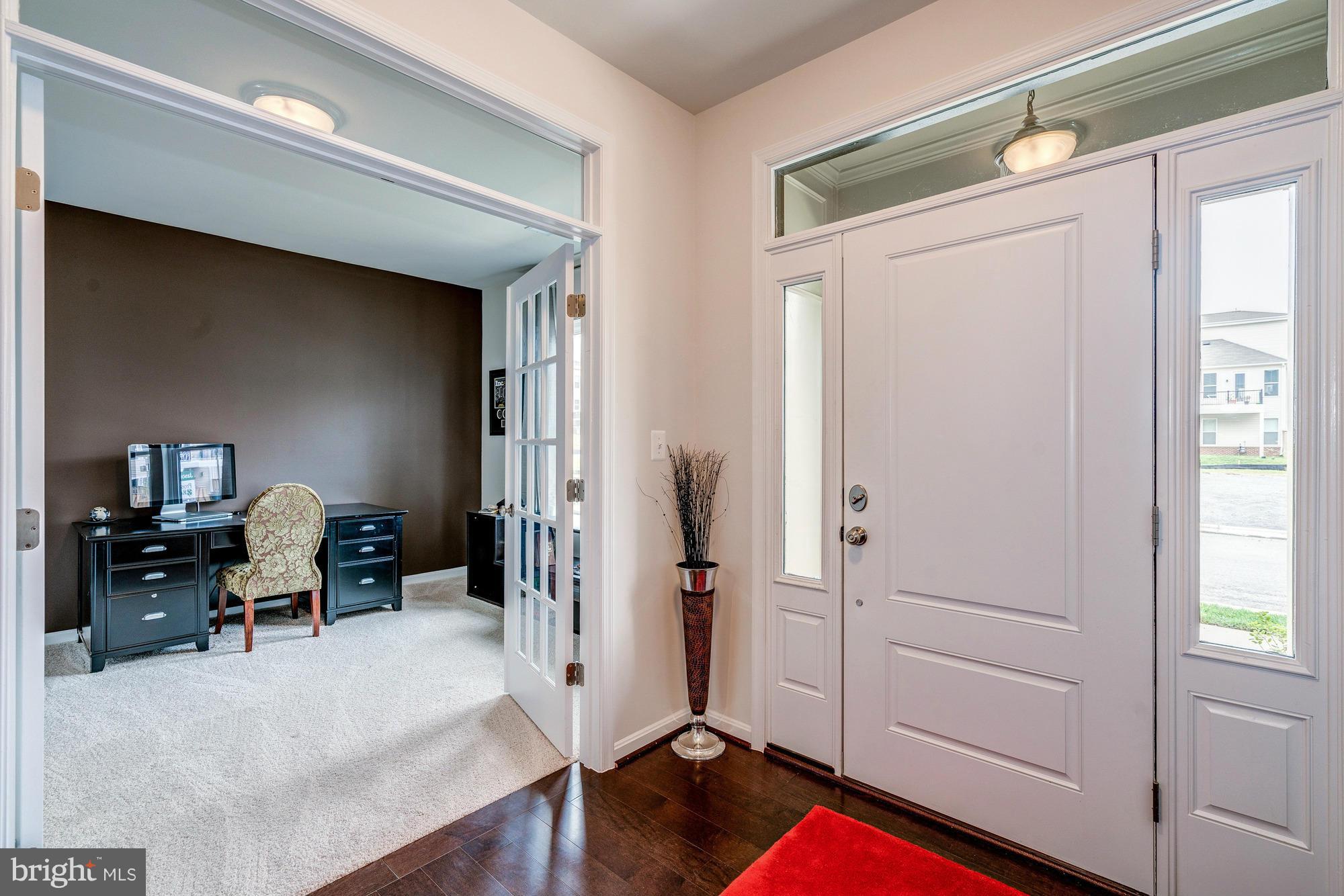 42277 Riggins Ridge Terrace Ashburn, VA 20148 - Photo 4 of 30 a bedroom with furniture and a window