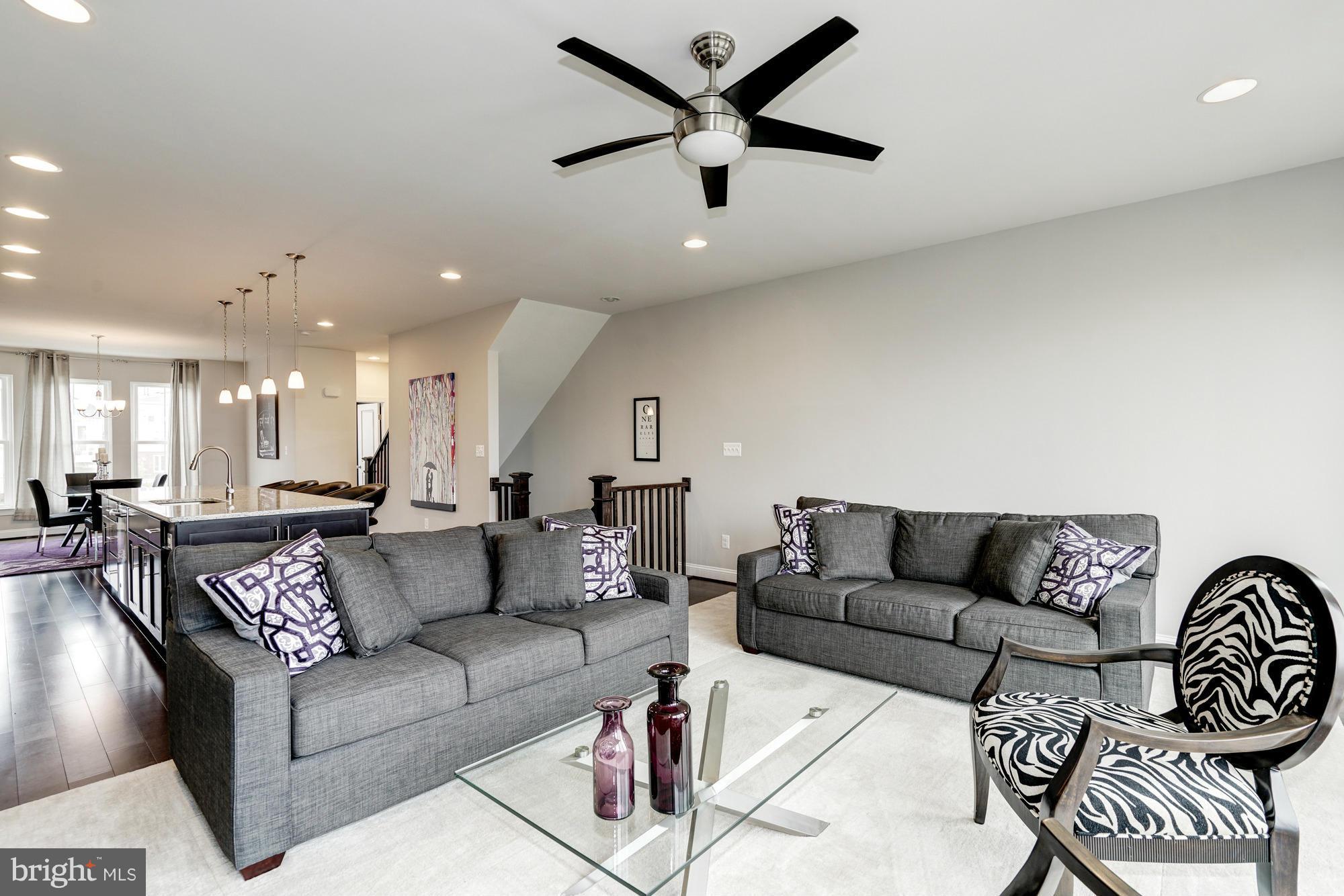 42277 Riggins Ridge Terrace Ashburn, VA 20148 - Photo 8 of 30 a living room with furniture