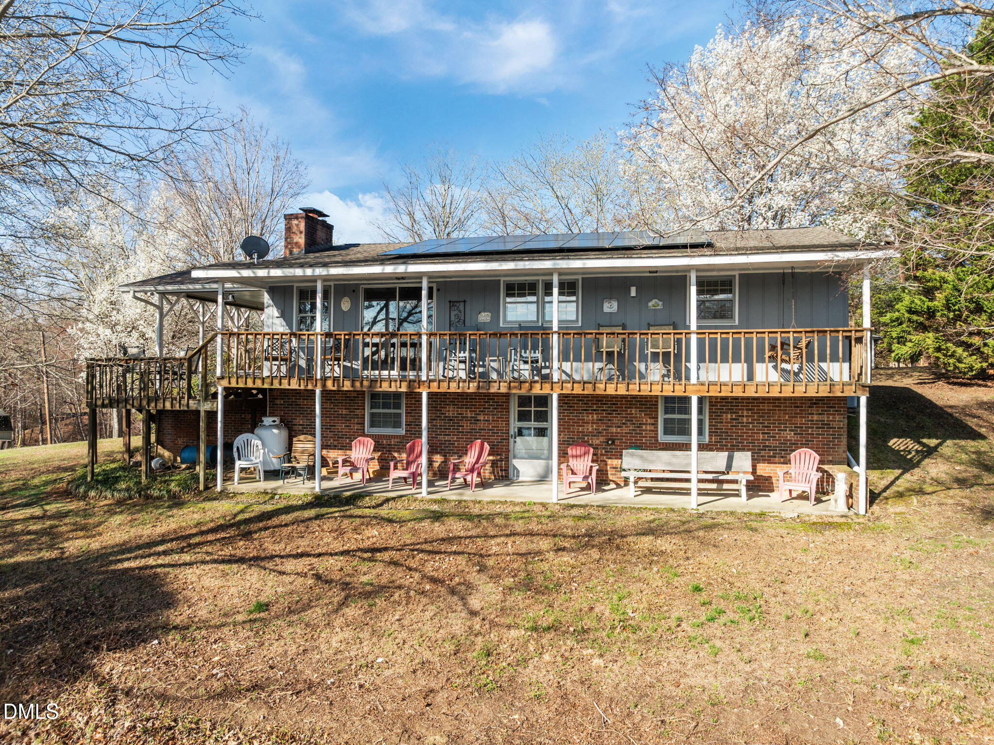 154 Spinnaker Lane Semora, NC 27343 - Photo 2 of 61 a front view of a house with a large window and a yard